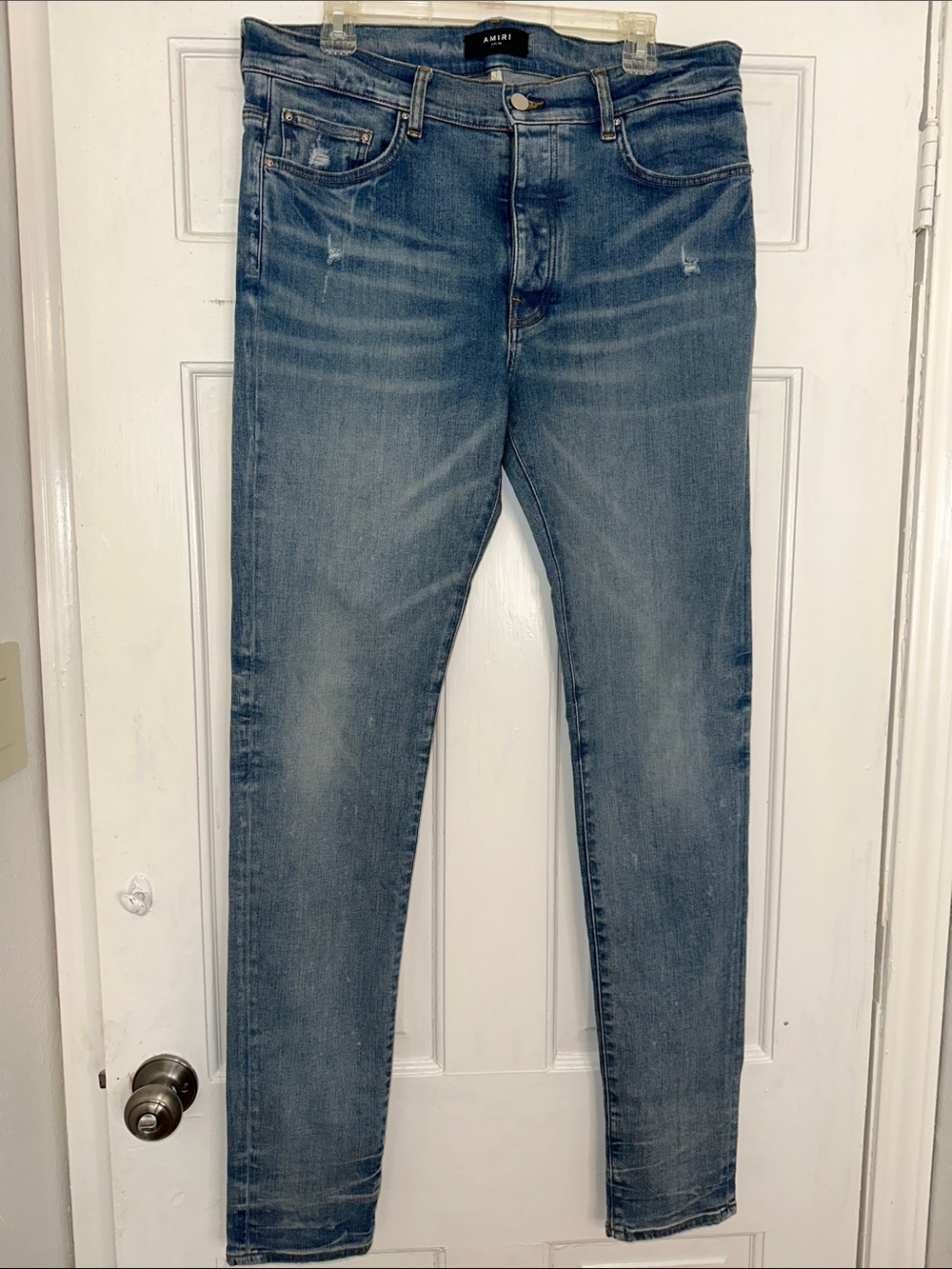 Amiri Clay indigo washed effect skinny cut jeans